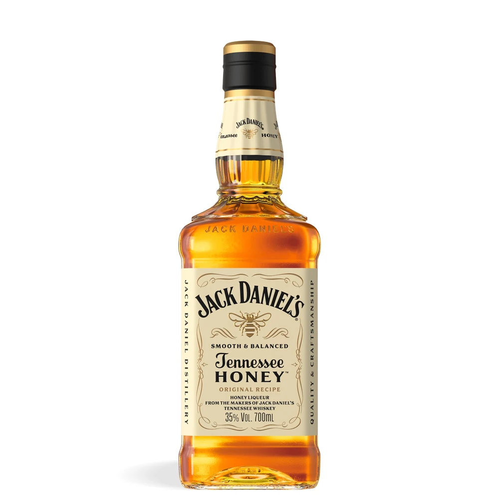 Boca Jack Daniel’s Tennessee Honey Whiskey 0,7 l prikazana uz medno zlatni vizual i ukrasnu etiketu.