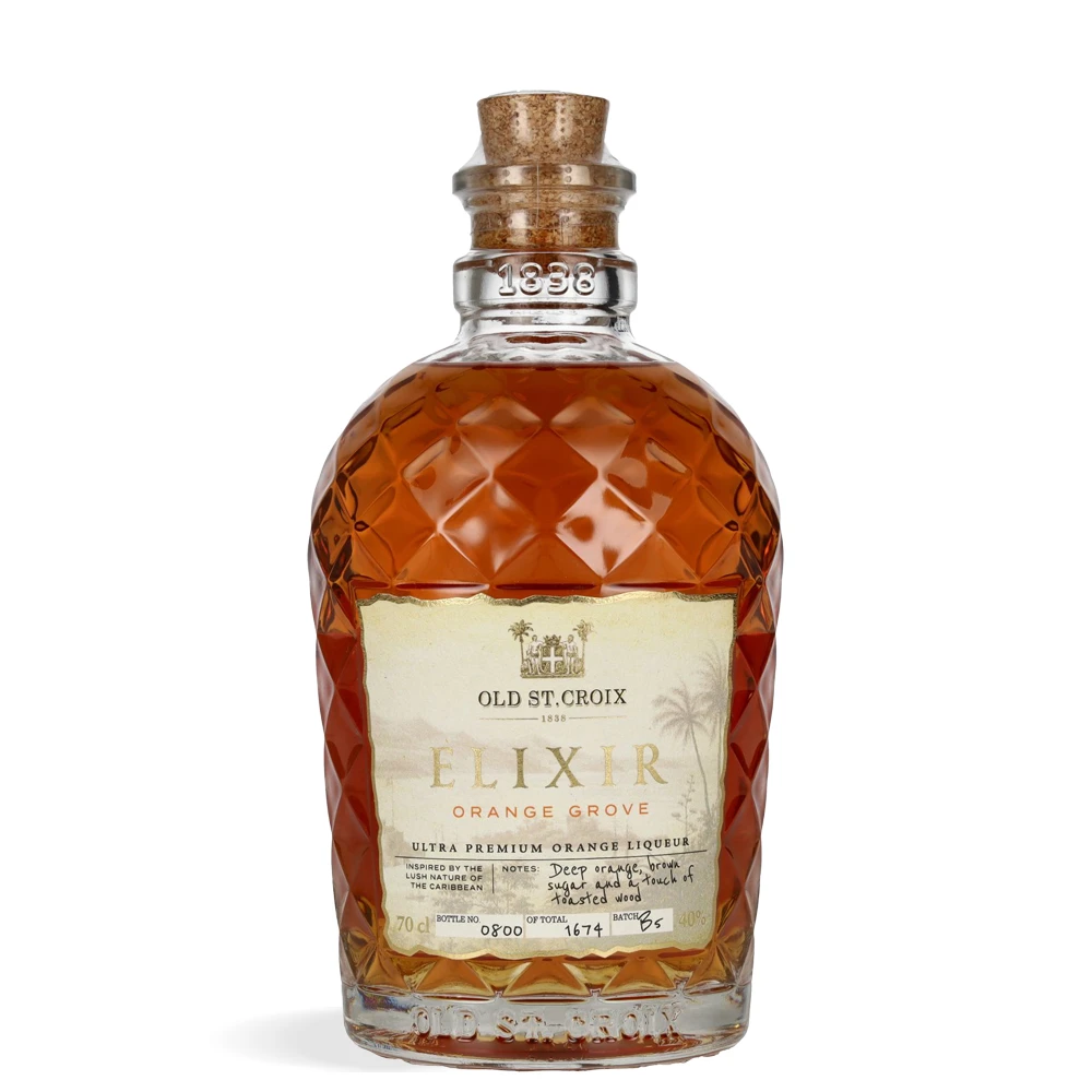 A.H. Riise Old St. Croix Elixir Orange Grove Liqueur 0,7 L u elegantnoj boci jantarne boje s klasičnom etiketom i profinjenim detaljima.