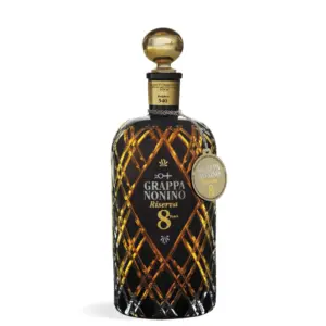 - [ ] Nonino Grappa Riserva 8 Years Old 0,7 L u luksuznoj crnoj boci sa srebrnim lancem i elegantnim dizajnom.
